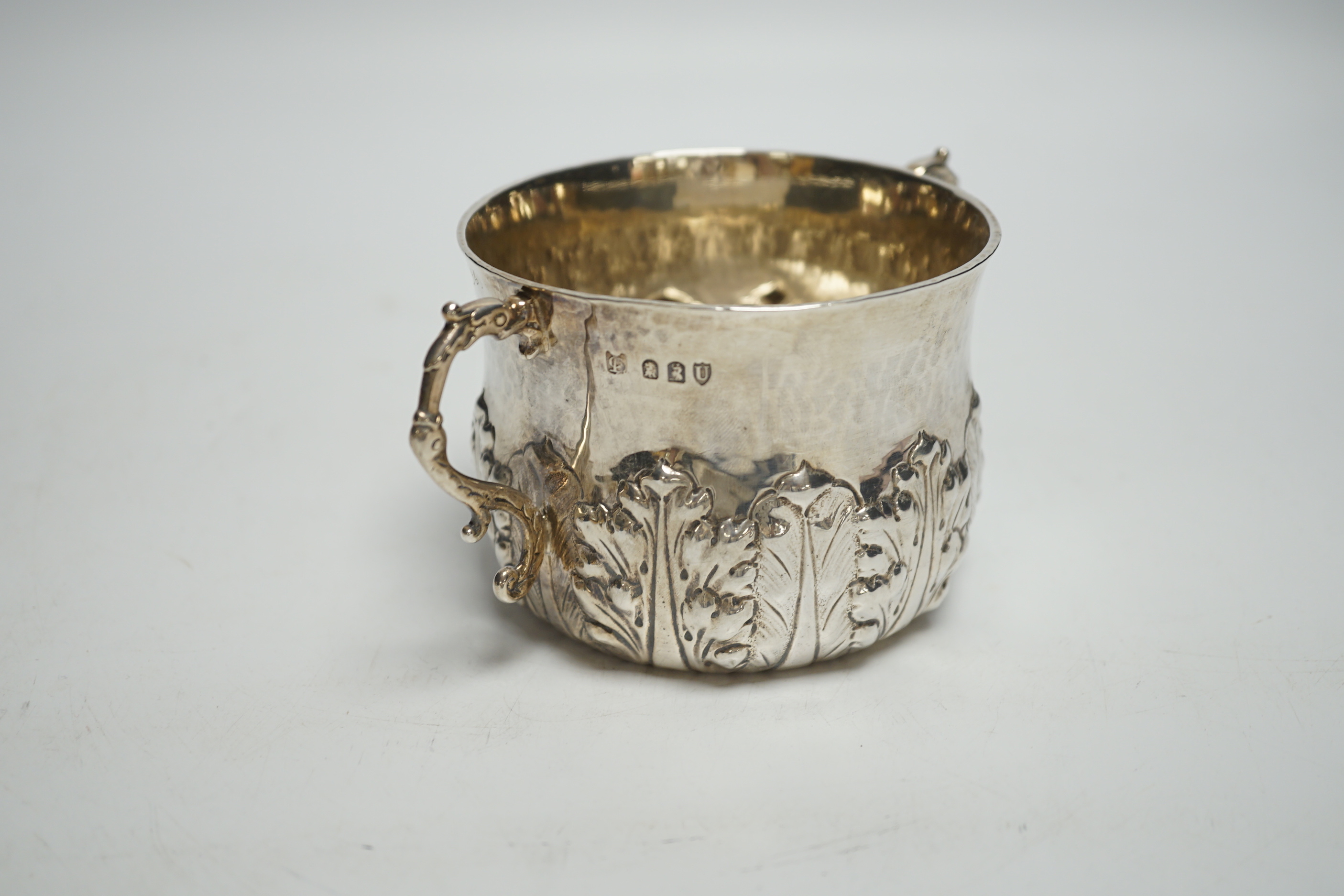 A late Victorian Britannia standard silver porringer with foliate decoration, Lambert & Co, London, 1895, with engraved inscription, 5.7oz.